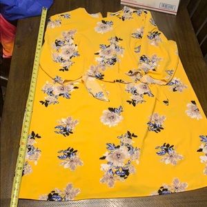 Super cute long floral top!